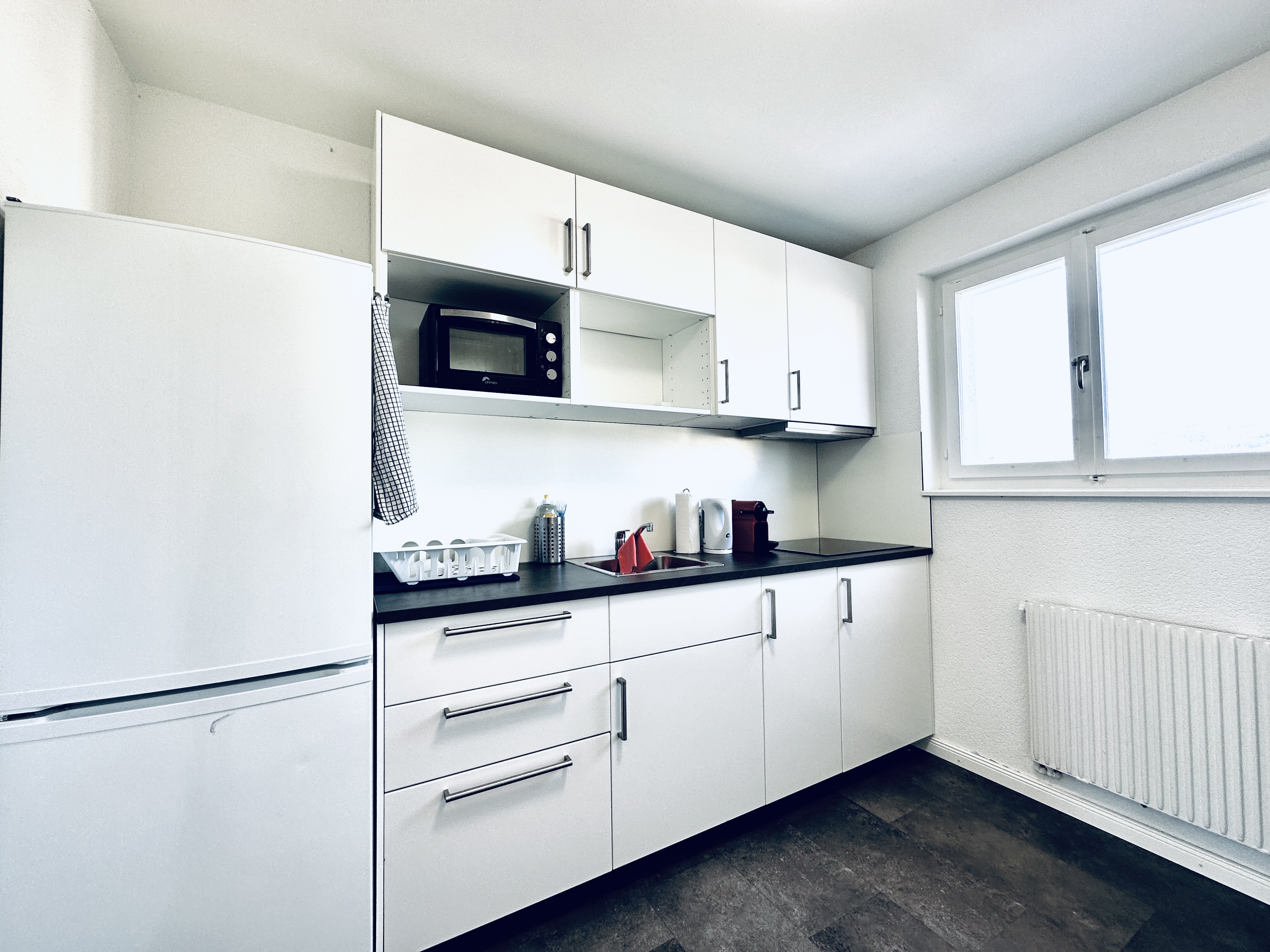 2-Zimmer-Apartment in Deitingen, Wohnraum mit Sofa